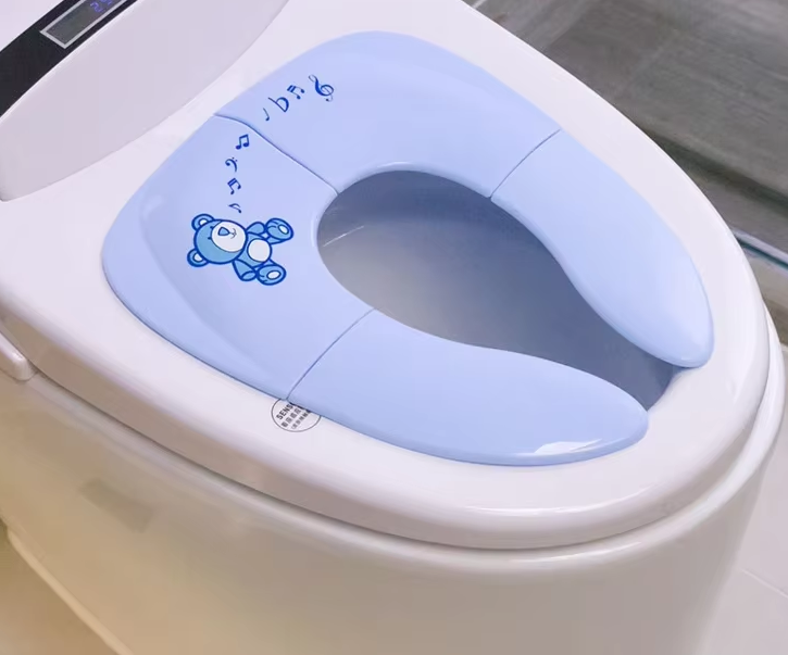 TinyTots - Kompakter Baby Toilettensitz für stressfreie Ausflüge